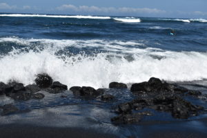 svart sandstrand Kona hawaii